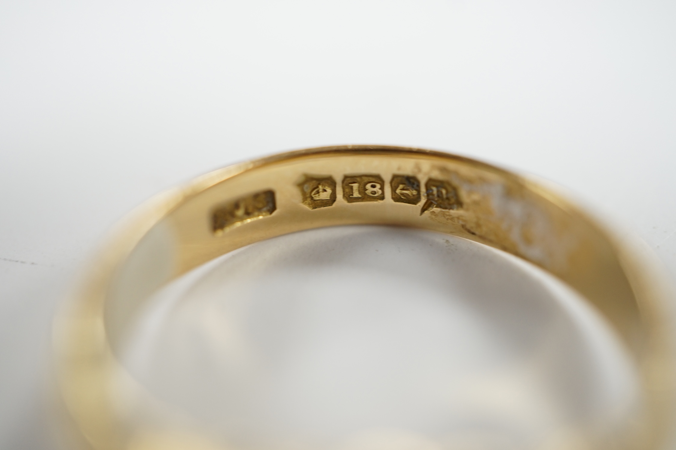 A George V 18ct gold and claw set solitaire diamond ring, size Q, gross weight 4.9 grams.